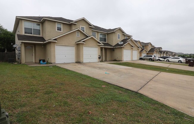 Converse 3 Bedroom Townhouse with Attached One-Car Garage and Large Fenced Backyard