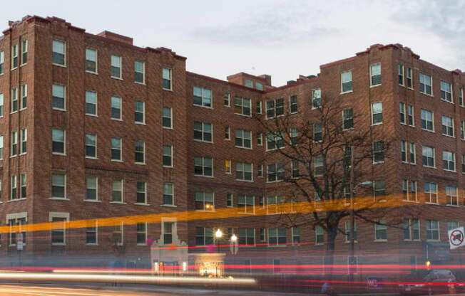 exterior of brick apartment building at juniper courts in washington dc