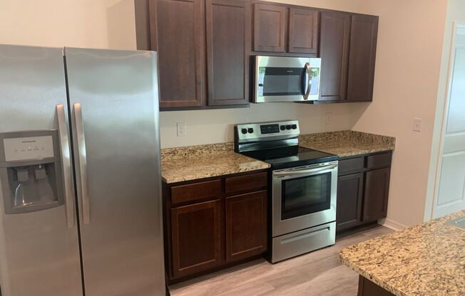 Beautiful Home Located In The New Chestnut Village Neighborhood On SW Archer Road