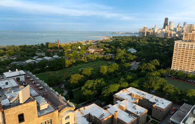 an aerial view of the city and the lake at the Belden Stratford in Chicago, Illinois 60614