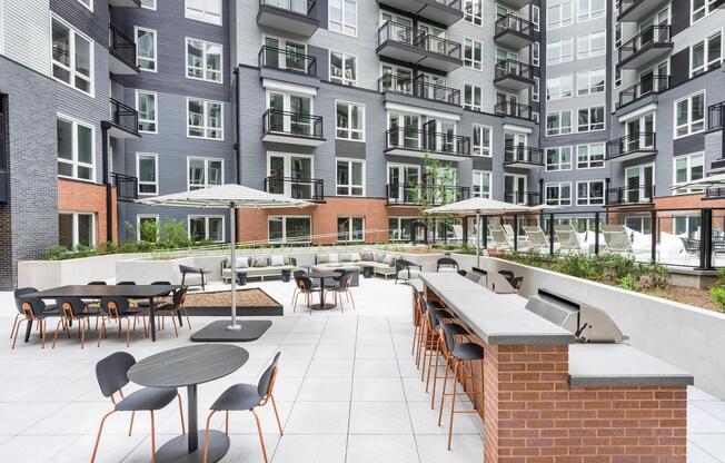 Gather with friends or unwind solo in our expansive courtyard, featuring grilling stations, shaded dining areas, and plenty of space to relax.