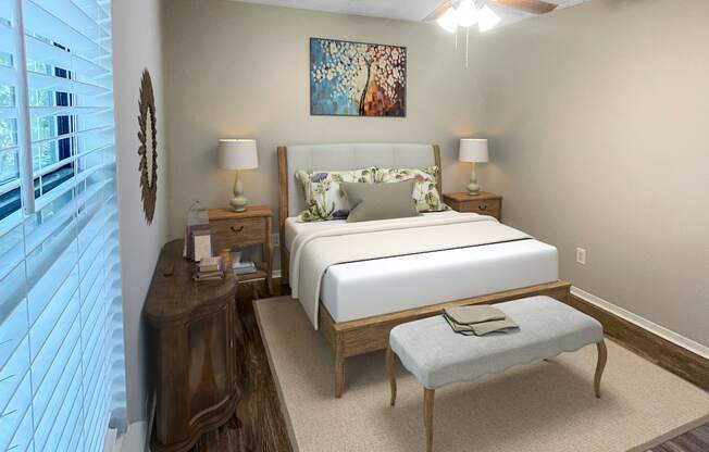 a bedroom with a bed and a ceiling fan at The Junction, Memphis, TN, 38111