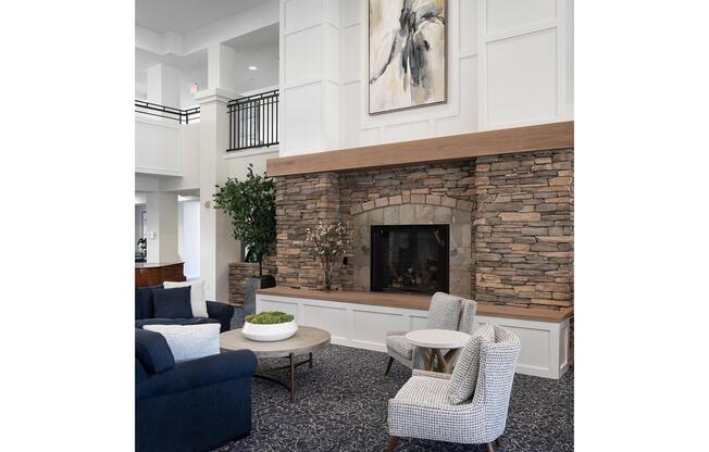 a living room with a stone wall