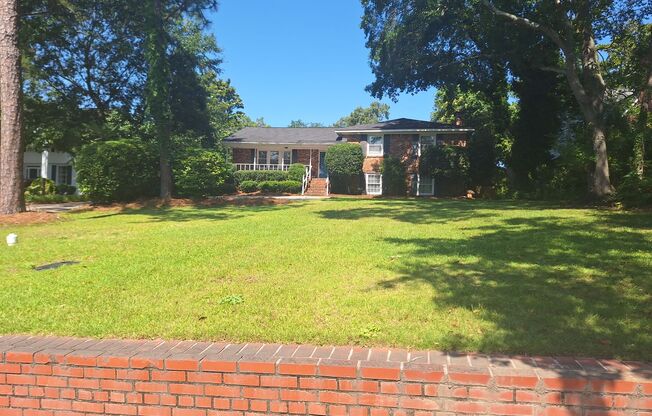Magnificent Four Bedroom Home - Minutes Away from Numerous Attractions!