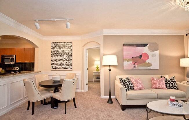 a living room with a couch and a table