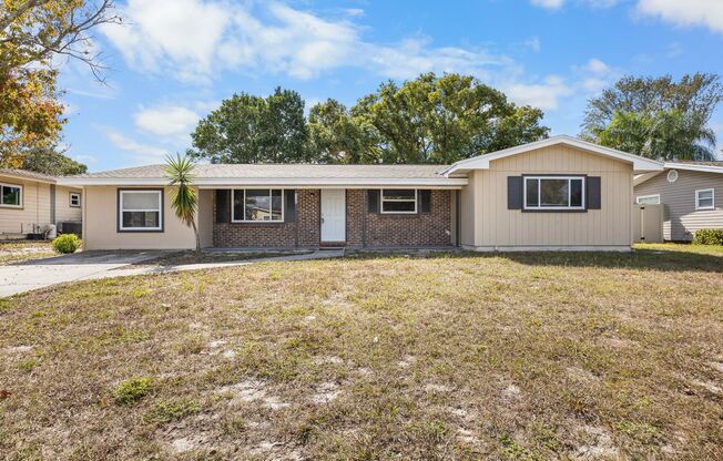 Beautifully renovated 4bdrm/2bath home with large yard