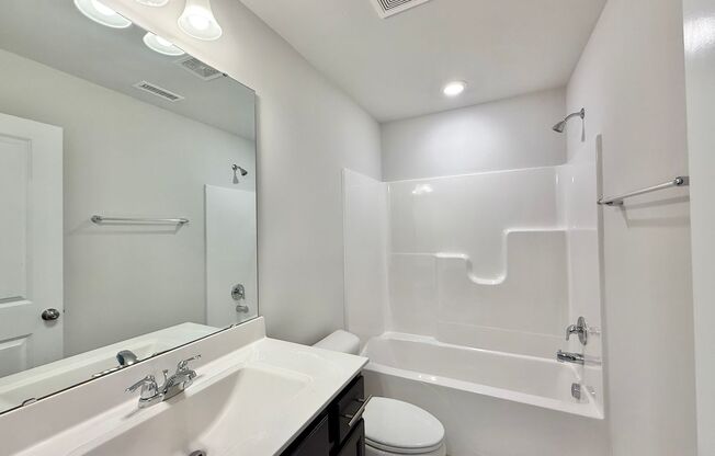 **OFFERING RENT PROMOTION FOR FIRST 6 MONTHS, WAIVED APPLICATION FEES & $200 MOVE IN PROMOTION** Stunning 3BD, 2.5BA Raleigh Townhome with 1-Car Attached Garage in Great Location Within an HOA Community