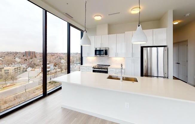 Stunning modern kitchen with custom cabinetry and plenty of space for cooking and entertaining