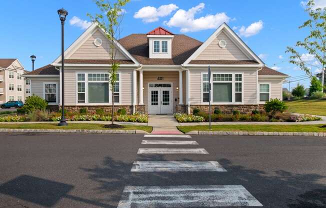 a house with a cross walk in front of it