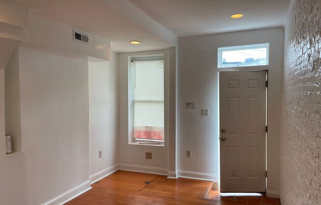 Charming 2-Bedroom, 1.5-Bathroom Brick Townhouse in Pigtown
