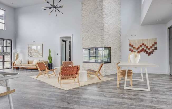 a living room with white walls and hardwood flooring at Copper 87, West Jordan, UT