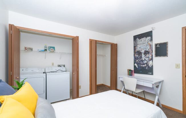 Bedroom with bed and work station at Martin Estates Apartments, Shelbyville, IN, 46176