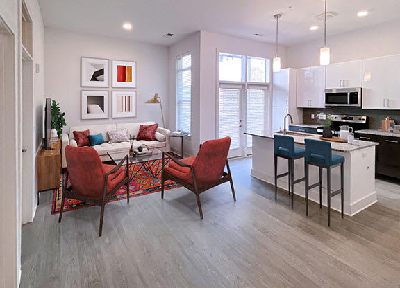 Modern Living Room With Kitchen View at Link Apartments® Linden, North Carolina, 27517