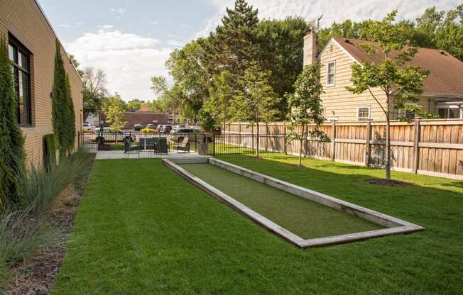 outdoor patio with bocce ball court