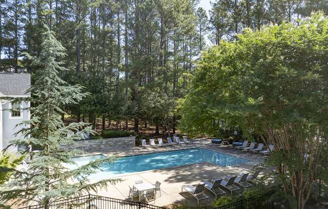 Pool deck with umbrellas and seating