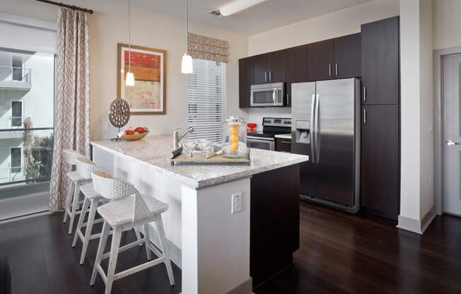 Open-Concept Kitchens with Stainless Steel Appliances at South Park by Windsor, 939 South Hill Street, CA