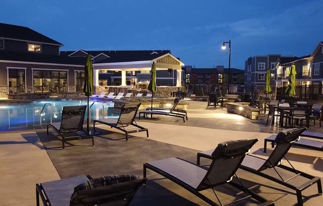 Night view of pool at Icon Apartment Homes at Ferguson Farm, Bozeman