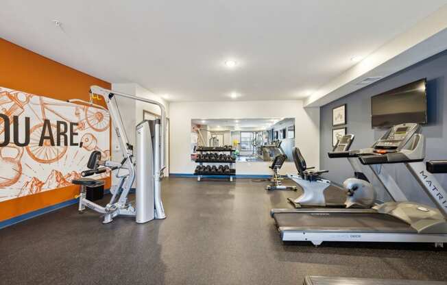 the gym with treadmills and other exercise equipment at the flats at jupiter