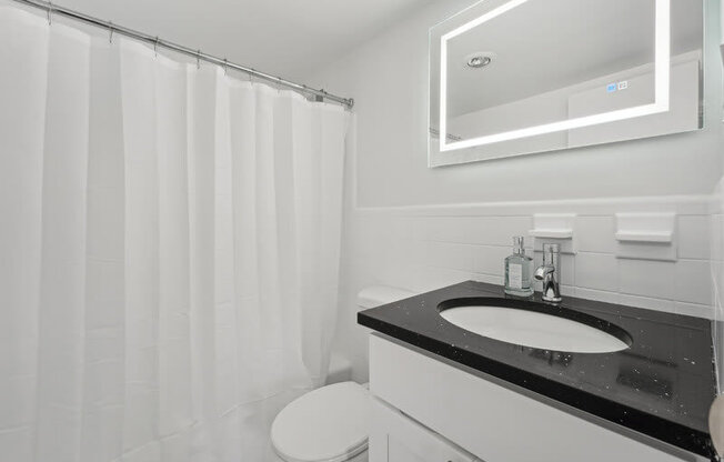 A Bathroom With a White Sink at Ashlawn at Southern Towers, Virginia, 22311
