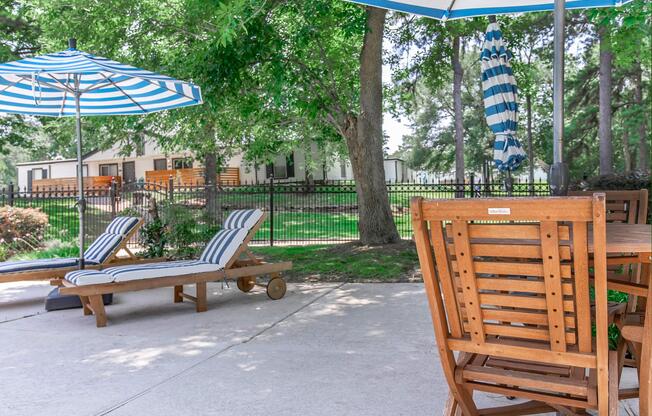 a wooden bench sitting in a chair