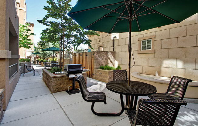 Pet-Friendly Apartments in San Jose CA - Aviara - Outdoor Grill Area with Shaded Seating