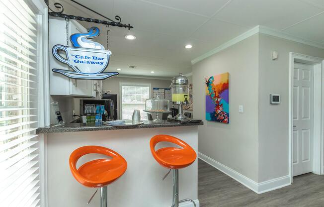 a kitchen with orange walls