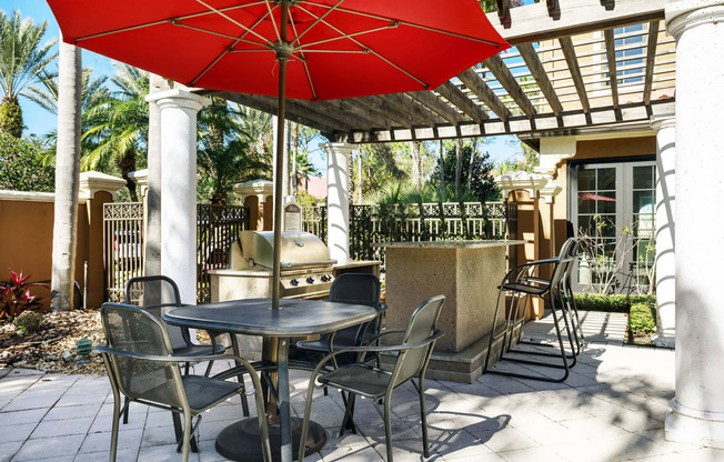 Outdoor Kitchen with Grill and Seating at Madison Gateway, Florida, 33716