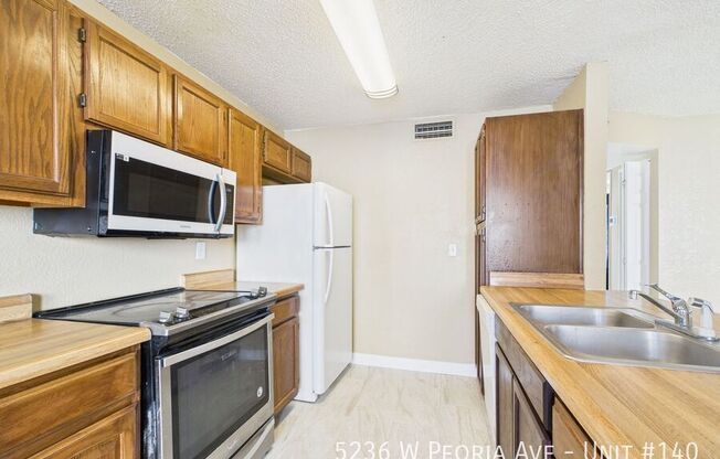 5236 W PEORIA AVE