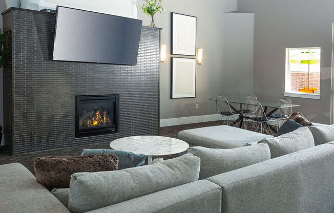 Quaint Fireplace Sitting Area In Clubroom at Four Seasons at Southtowne Apartments, South Jordan, 84095