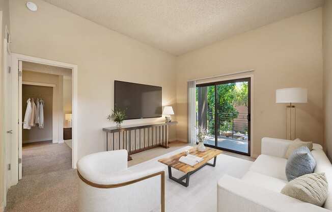 a living room with a couch and a television