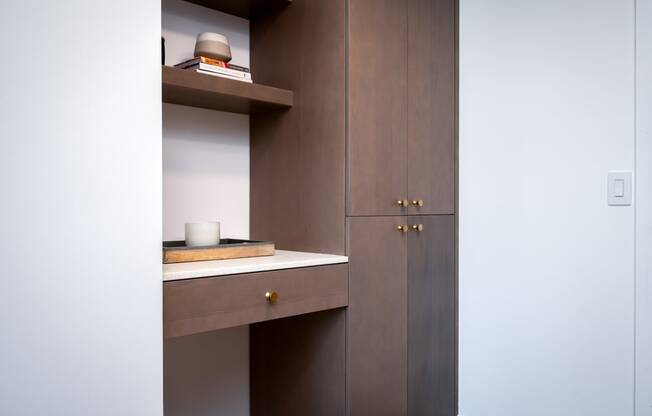 a cupboard with a sink and a shelf in a bathroom at Slabtown Square Apartments, Oregon