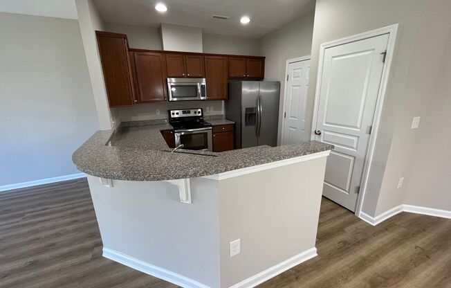 Corner Unit 3BD, 2.5BA Townhouse in North Raleigh with 1-Car Garage and Premier HOA Amenities