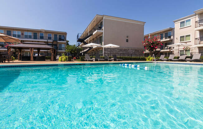 This is a photo of the pool area at The Summit at Midtown Apartments in Dallas, TX.