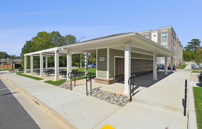 A covered walkway leads to a building with the number 1001 on it.