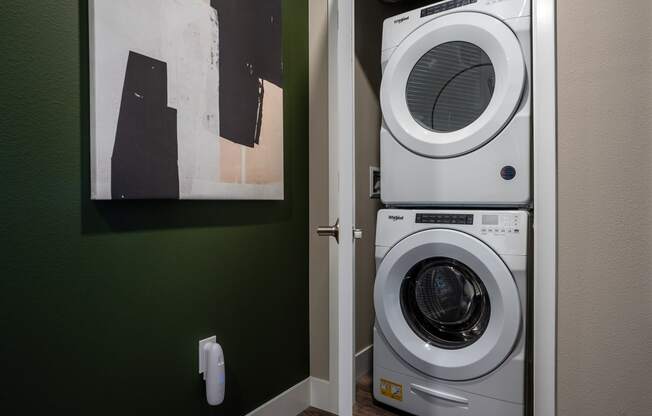 a washer and dryer in the laundry room