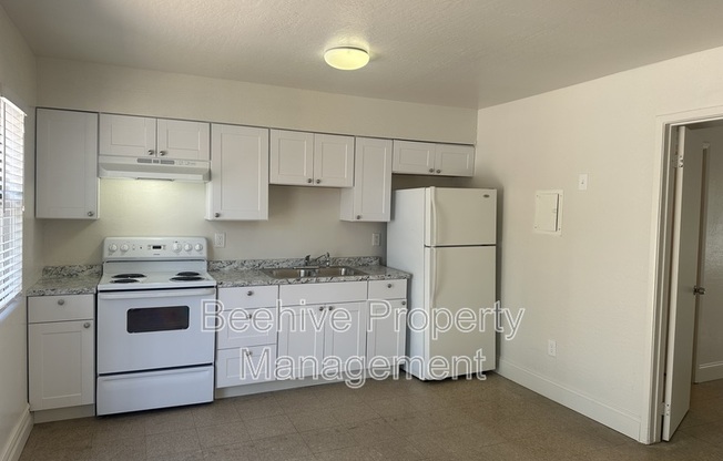 1102 E POLK ST