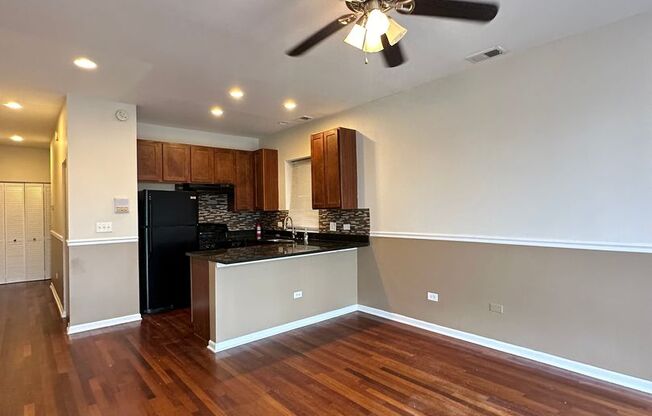 7654 S. Colfax Ave.