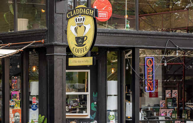 Claddagh Coffee Shop with a sign that says