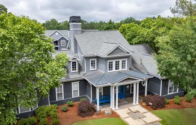 A house with a blue door and white trim.