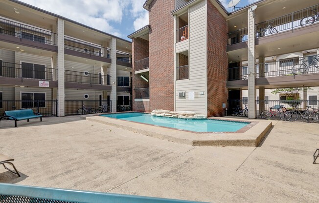 UT PRE-LEASE: Large 3 bed/2 bath Centennial Condos unit. Just steps from UT Campus!