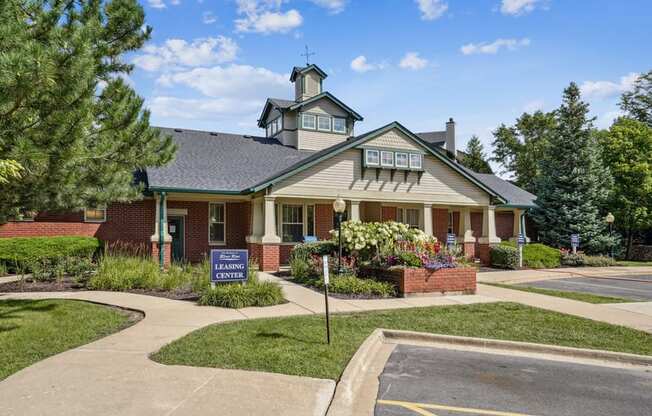 A house with a sign that says "CLEANING" in front of it.