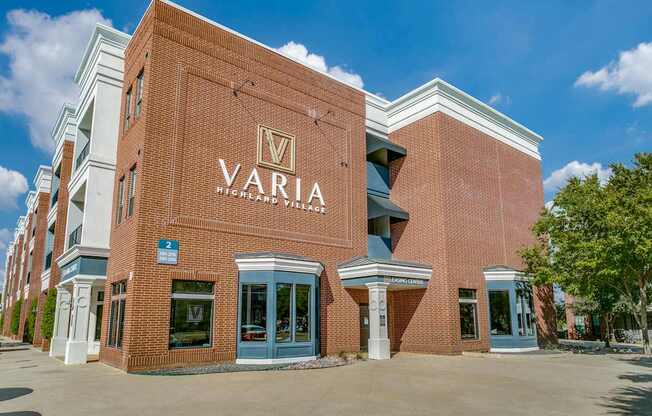 a brick building with a varia physiotherapy center on the side