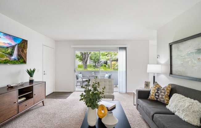 a living room with a couch and a coffee table