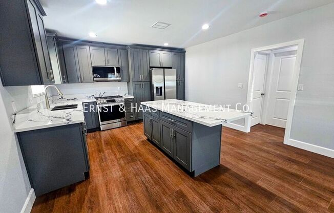1551 W 103 ST