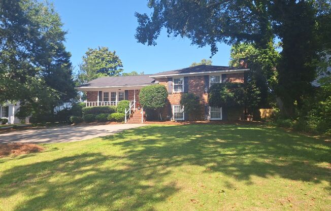 Magnificent Four Bedroom Home - Minutes Away from Numerous Attractions!
