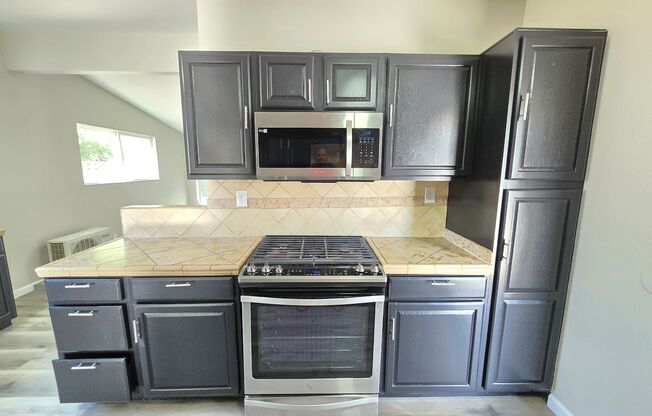 Spacious 4- Bedroom Remodeled Home in Palmdale - Gated yard & Utility Credit