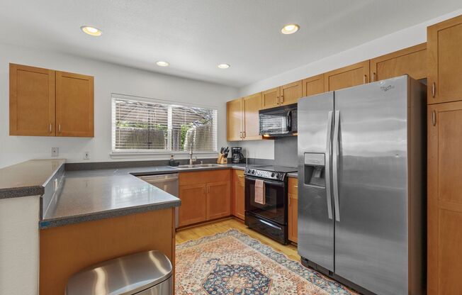 Hillside 3 BR House | W/D • 2 Car Garage • A/C