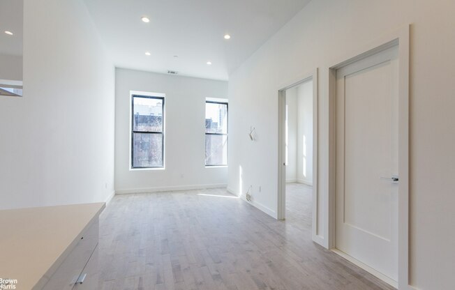 111 W 130 ST
