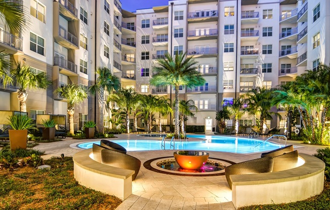 Juno at Winter Park apartments in Winter Park Florida photo of resort-style pool with firepit features