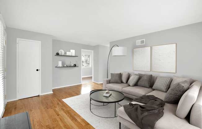 a living room with a couch and a coffee table